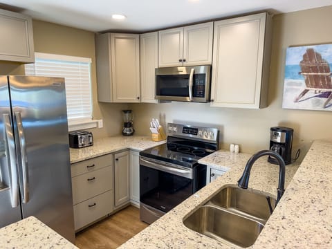 Updated kitchen with new appliances & all the amenities you need