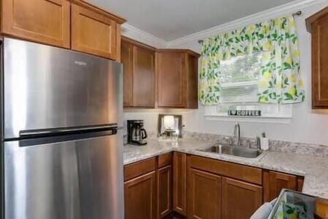 Kitchen with Refridgerator, Freezer, and Coffee Pot
