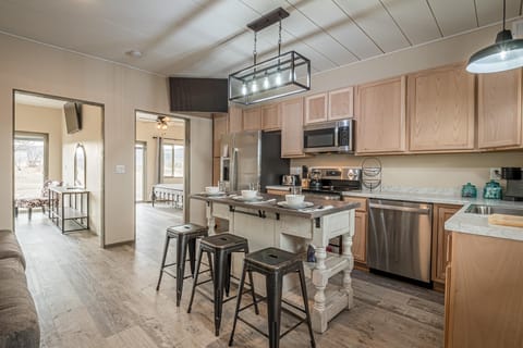 Whip up your favorite recipes in this sleek and functional kitchen.