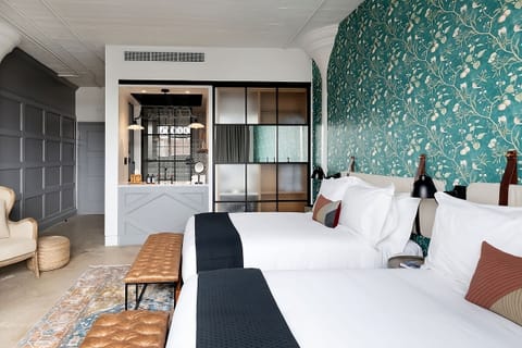 Unwind in a spacious room with boutique-hotel design details.