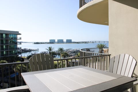Step onto the balcony and immerse yourself in the tranquility of the resort's grandeur, where sweeping views inviting you to relax and unwind amidst the beauty of the outdoors.