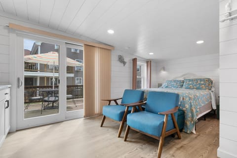 Queen bed studio with kitchenette, private deck and grill.