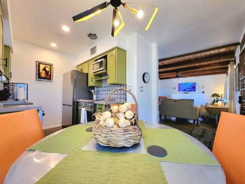 Dinette looking into living room and kitchen