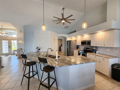 Kitchen with granite countertops and stainless steel appliances