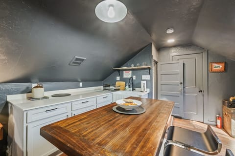 Gather around the table in a dining area where coziness and comfort are at the heart of every meal