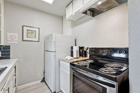 Everything you need at your fingertips, including a full-size fridge, oven, coffee station, and plenty of counter space.