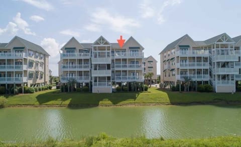 Back side of unit from lagoon on back side of condo.  Top level right side.