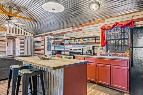 The kitchen comes with everything you need to make a meal or enjoy take out from any of the local restaurants.