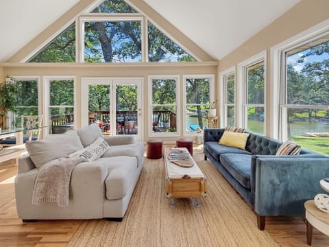 Welcome to the Lake - astounding views looking right onto the water!  My favorite room - the Sunroom located on the main level - perfect game area, coffee spot, relaxing area.  