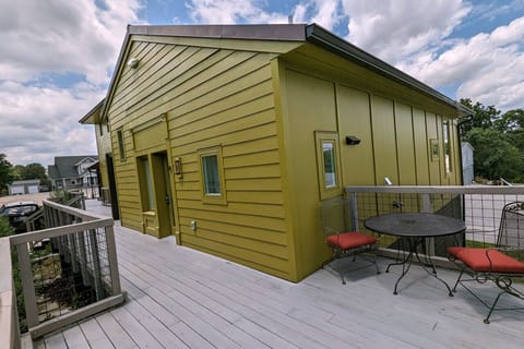 Private Deck #4 at the end of the walkway. A lovely place to catch a breeze from either west to east, & north to south -- it was a coveted location during construction.