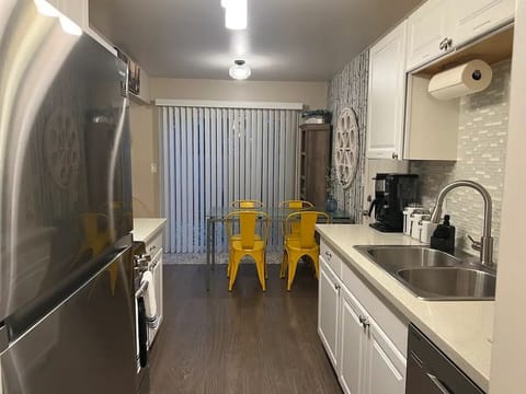 Entry to kitchen looking into dining area