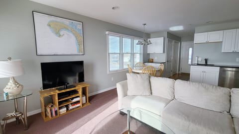 Living room with dining area beyond