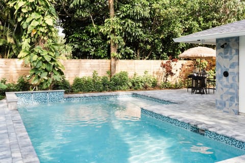 Outdoor Pool Area with Shower