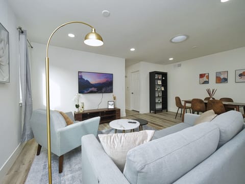 Cozy, open kitchen and dining area, comfortably accommodating six guests