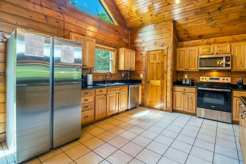 Full kitchen includes stove top, oven, microwave, dishwasher, refrigerator, and more!