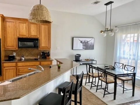 COMFORTABLE DINING AREA WITH GREAT NATURAL LIGHT