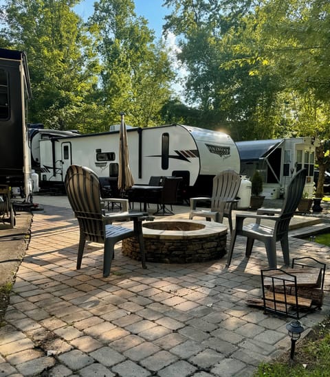 Our lot with fire pit and patio area for grilling out 