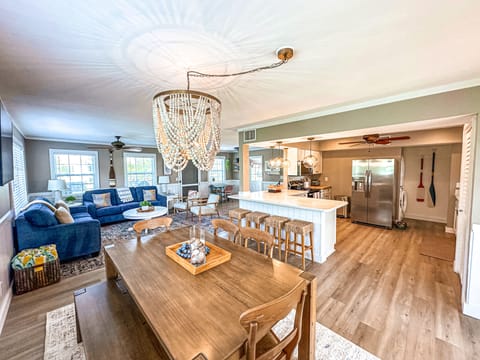 Dine at the spacious dinner table or breakfast bar