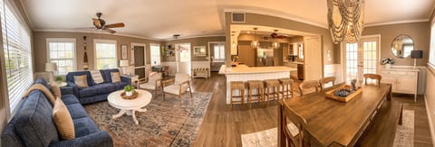 Panoramic view of the entire open concept living, dining and kitchen areas