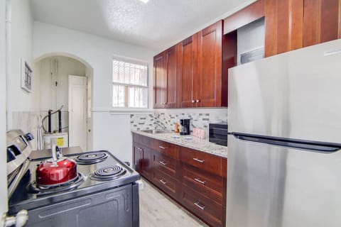 Fully equipped kitchen with pots, pans, silverware, and much more