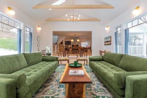 Livingroom view back to open dining room and kitchen area 