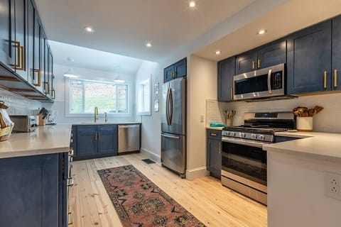 Kitchen with all the appliances and kitchen items to make a family gourmet meal