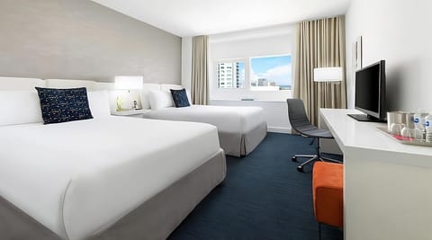 Settle in comfortably with two plush beds and workspace.