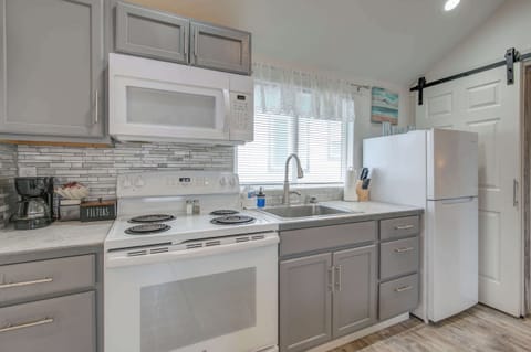 Contemporary kitchen with clean lines, neutral tones, and modern finishes.