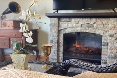 Electric Fireplace and Smart-TV in Master Bedroom.