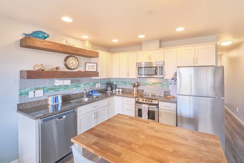 Bright kitchen with modern appliances.