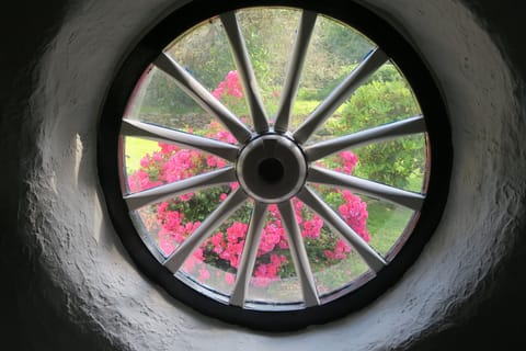 Window made from an old cartwheel