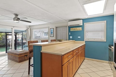 Prep and eat in comfort with AC at your kitchen counter with bar stools.