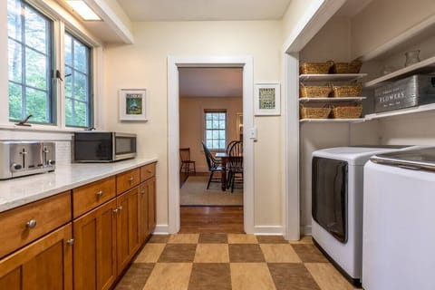 Coffee station and laundry area, both well stocked.