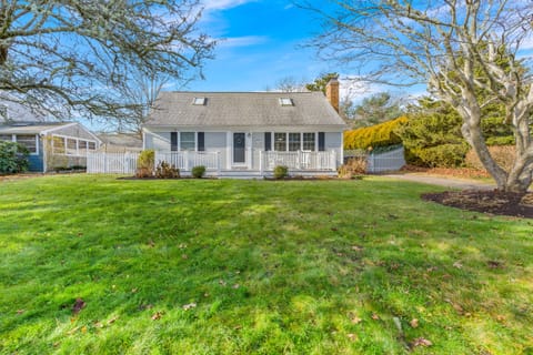 Front yard with a porch that overlooks a small bay