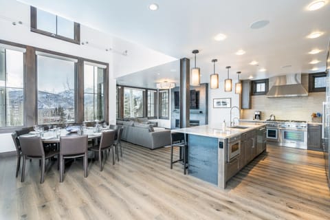 Kitchen - Airy, open concept with vaulted ceilings and ample light