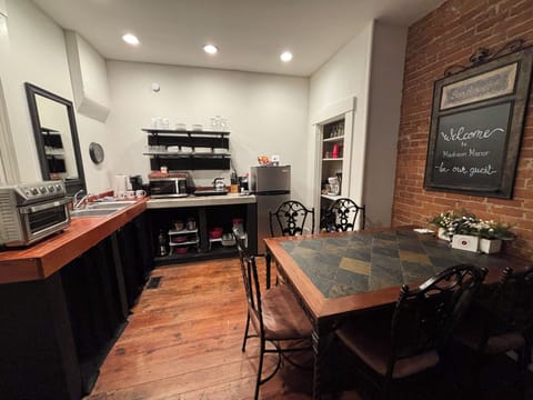 Fully equipped kitchen with cookware, dishes, & essentials