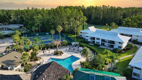 Unwind in the heart of the resort, where sun-soaked pools and courts create the perfect balance of leisure and play.