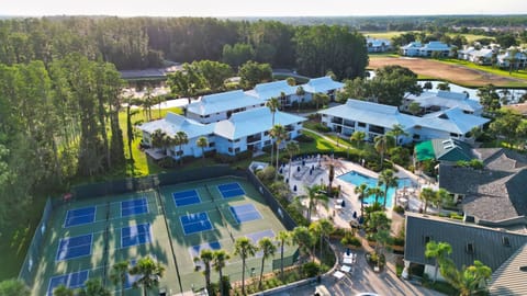 Where recreation meets relaxation — courts, pools, and palm-lined pathways await.