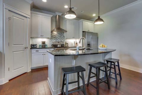 Chic island seating, the ideal spot for quick bites or evening wine.