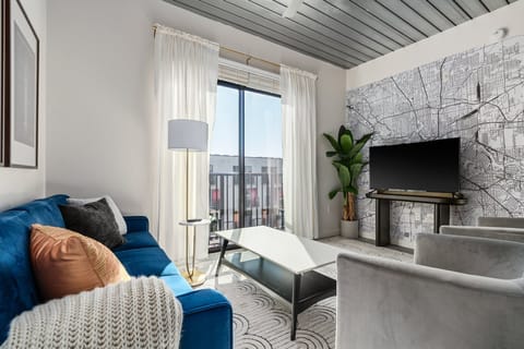 Cozy up in this inviting living space with a smart TV for entertainment.