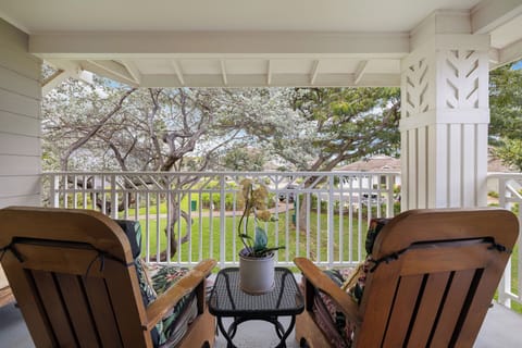 Settle into your private balcony, where lush garden views and peaceful shade invite you to relax with morning coffee or a good book in hand.