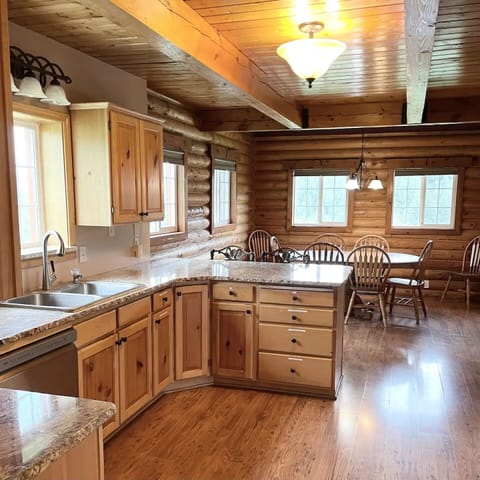 Fully stocked kitchen with all the equipment you need for cooking.