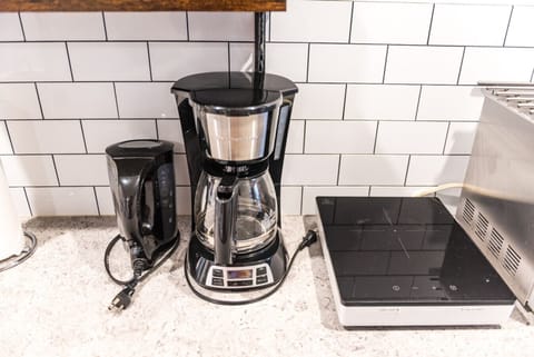 There is a hot plate to cook meals on.