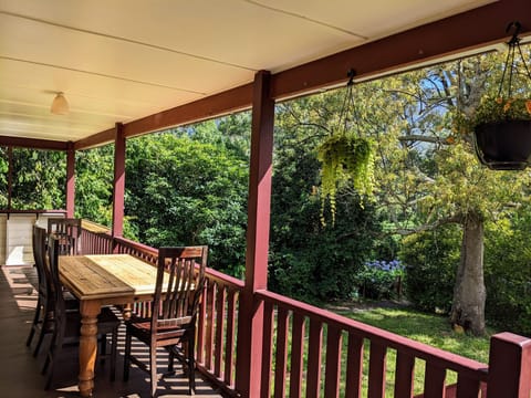 Front veranda outdoor setting with views of the front garden