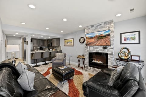 Spacious Living Area w/ Comfy Seating & Fireplace