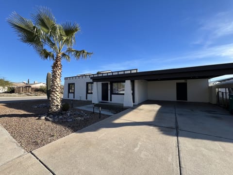Front driveway and covered parking 