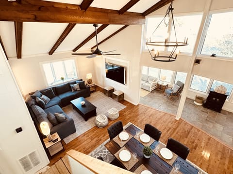 Birds-eye view of living room, dining room and sun porch
