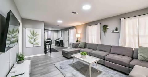 Cozy and stylish sofa, perfect for relaxing and enjoying movies at home