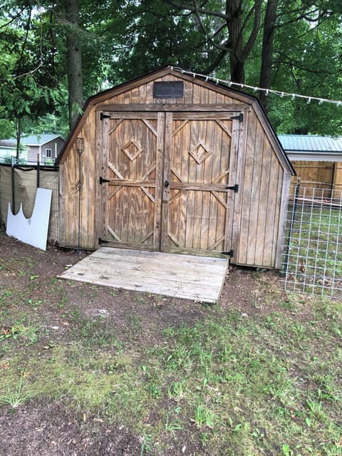 Shed with outdoor games, chairs, hammocks,