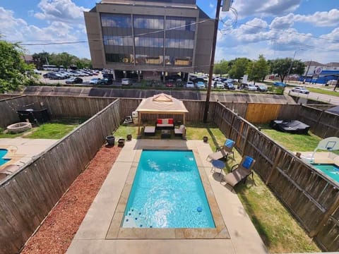 Inviting private pool with sunny seating and relaxing backyard vibes.